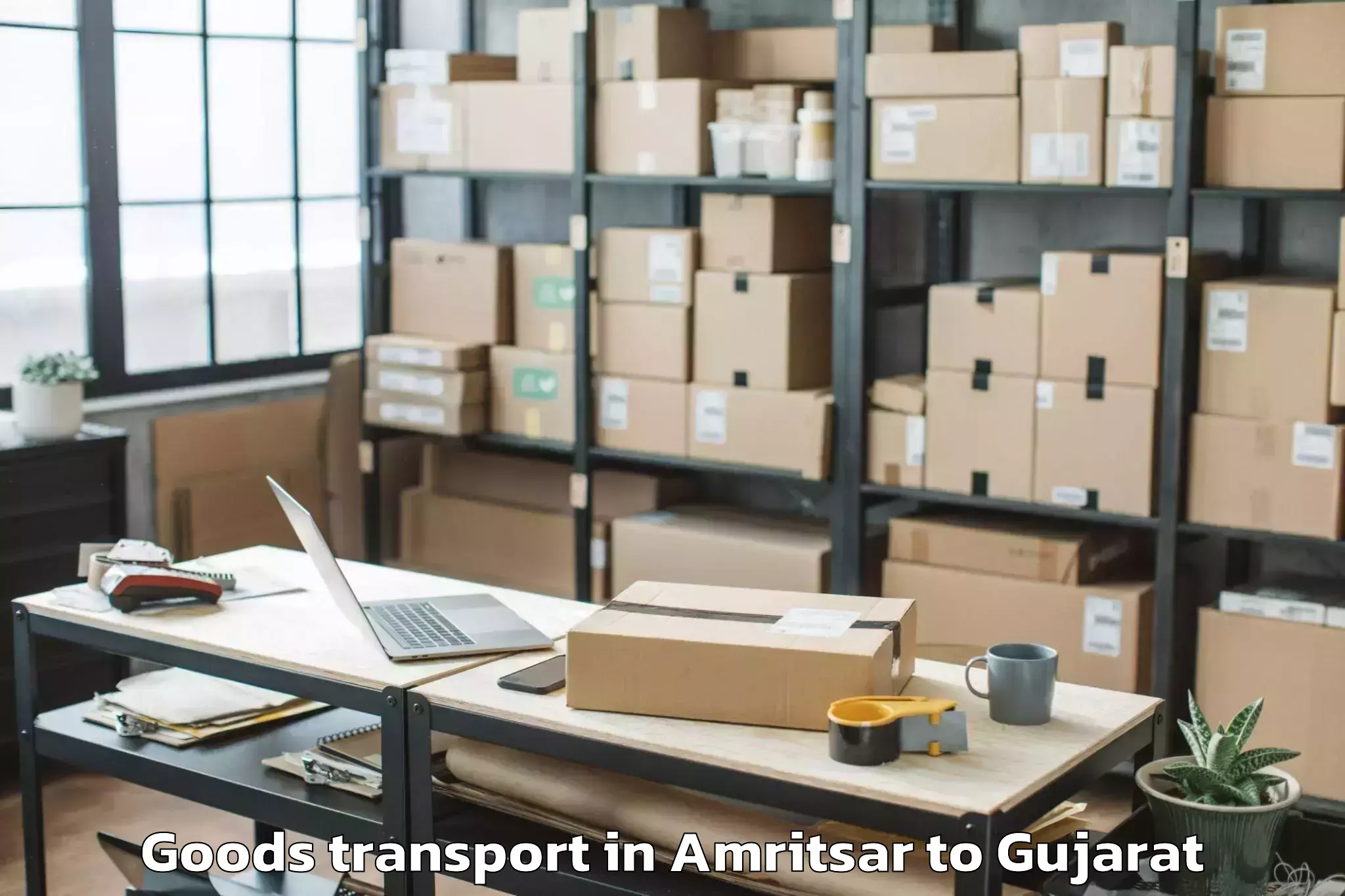 Top Amritsar to Gujarat Ayurved University Jam Goods Transport Available